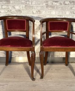 Coppia di poltroncine originali a pozzetto in faggio